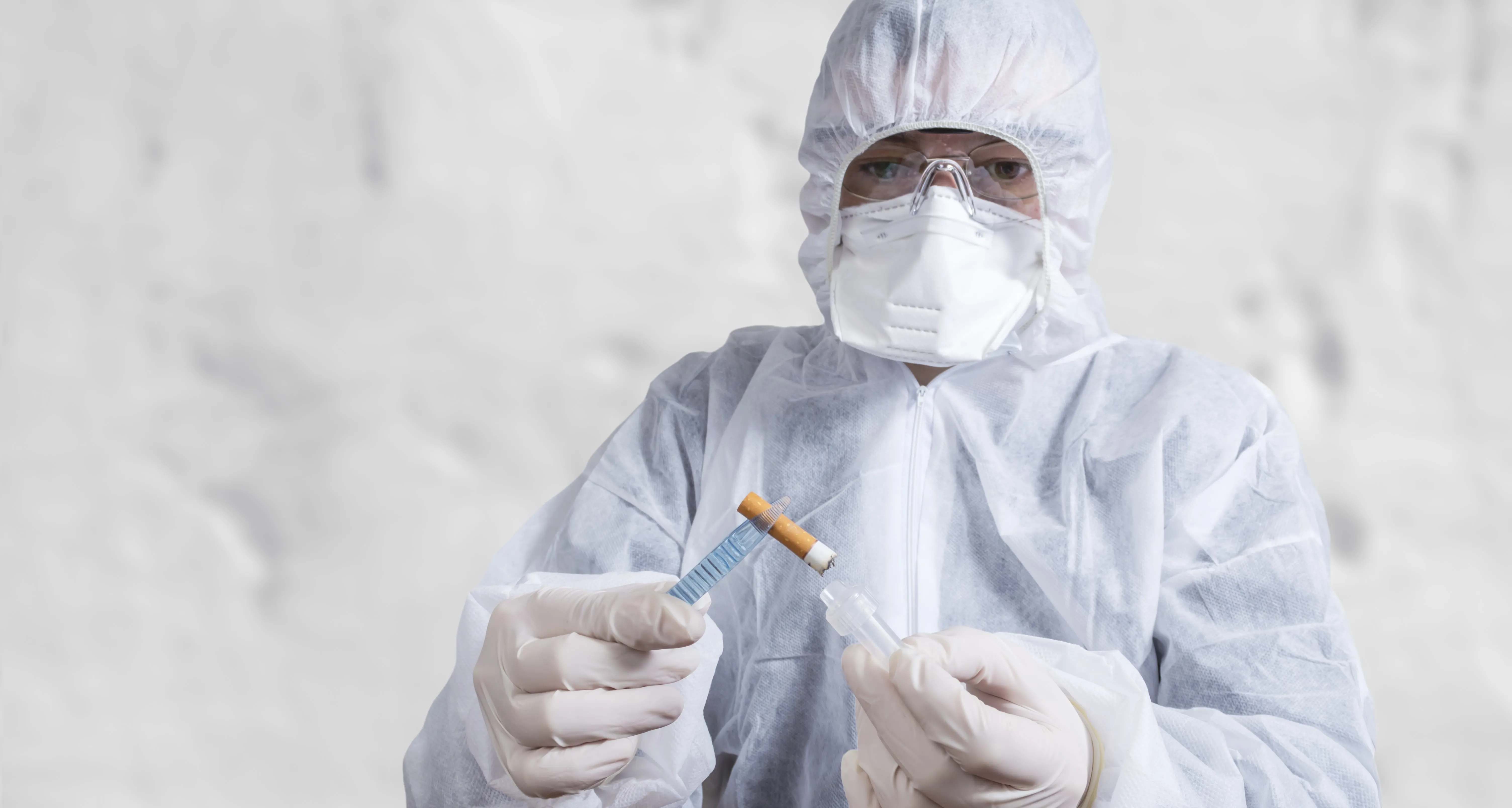 lab worker testing cigarette
