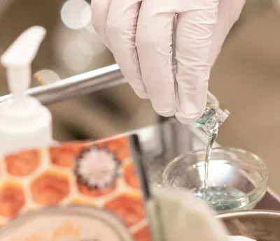pouring chemical from testtube